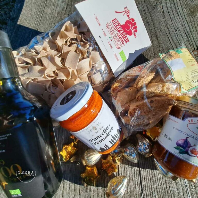 TerraTuscia Pasta, Oil and Sweets | Bella Italia on the gift table. Pasta made from Antique Spelt, Tomato Sauce with Bacon and Olive Oil Extra Vergine. Traditional Tozzetti Cookies with Nuts and Fig marmelade. Delicious indulgence. Completely organic.